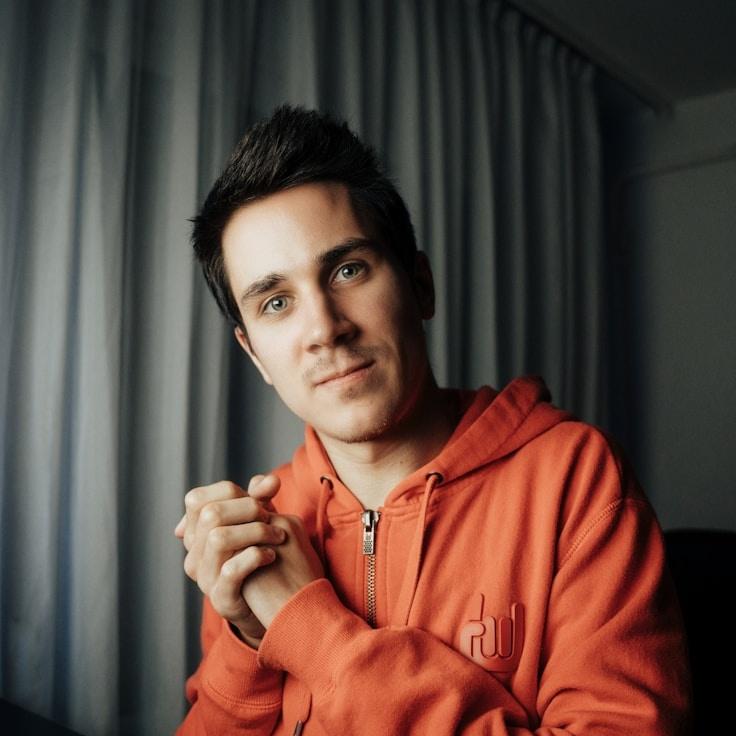 Dev Malik, Client Relations Director, discussing corporate gifting strategy with business clients